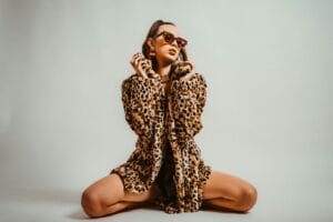 Woman wearing a leopard print outfit, illustrating how to wear animal print outfits in an animal print styling guide.